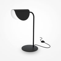 Lampe de chevet Mollis dans une chambre moderne