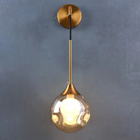 GLOBIA – Applique Murale Dorée avec Globe en Verre Lumio™