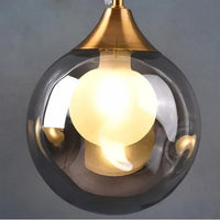 GLOBIA – Applique Murale Dorée avec Globe en Verre Lumio™
