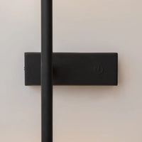 Applique murale ronde Anouk installée au-dessus d'une console d'entrée, vue 10
