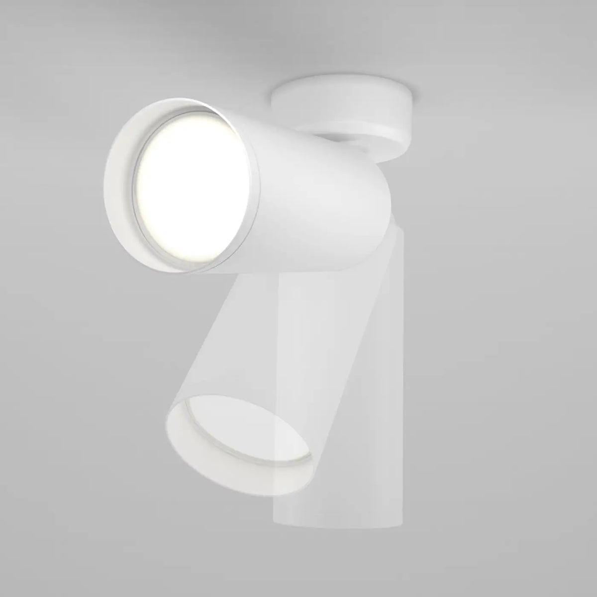 Gros plan sur le cylindre orientable de l'applique murale en acier.