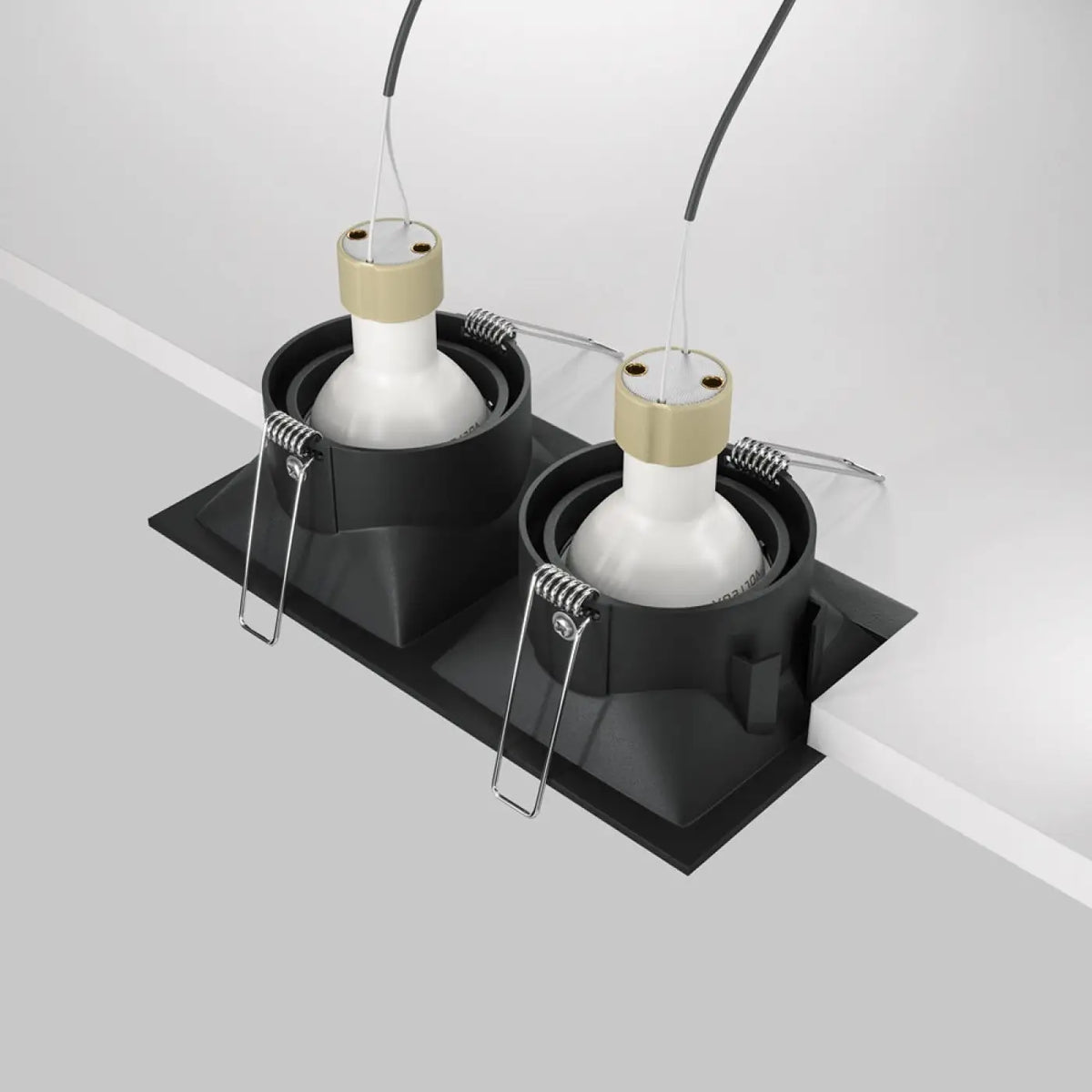 Spot encastrable double installé dans une entrée contemporaine