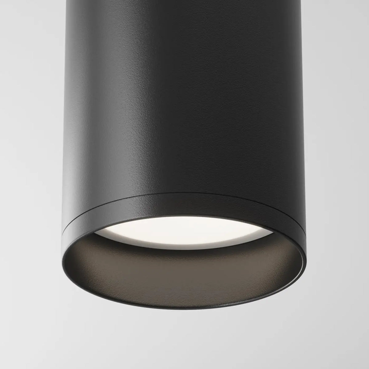 Spot cylindrique en acier noir fixé au plafond pour un éclairage dirigé, vue 7