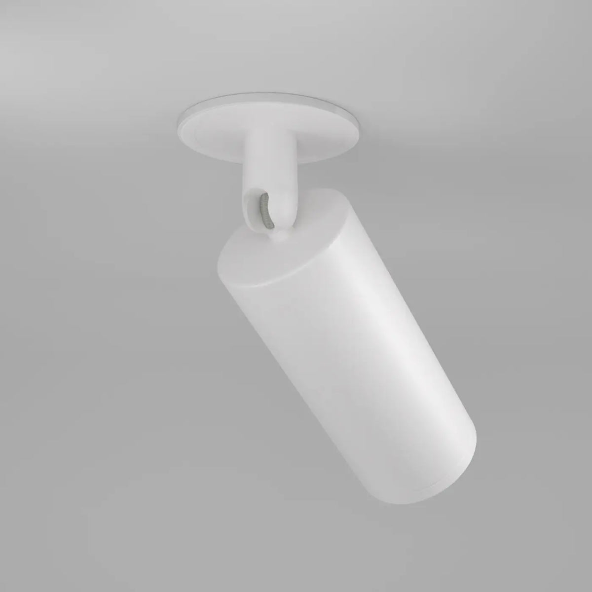 Spot orientable blanc au-dessus d'un îlot de cuisine.