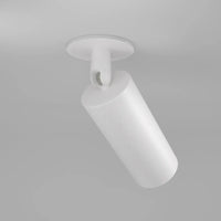 Spot orientable blanc au-dessus d'un îlot de cuisine.