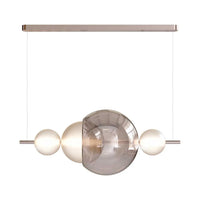 Suspension en verre Astra finition Rose diffusant une lumière chaleureuse 3000K